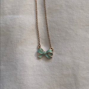 Blue and gold bow necklace